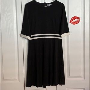 Black Dress with white cuffs and two stripes